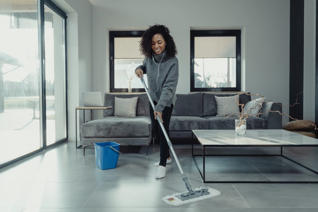 lady mopping tiled floor