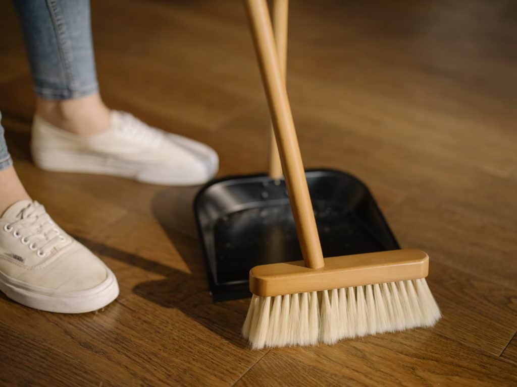 sweeping and collecting dust