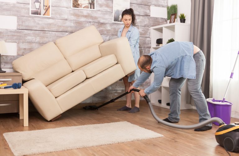Wife picks up sofa